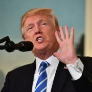 Trump defends Asia trip, vows 'maximum pressure' on N.Korea