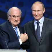 Blatter says he is going to World Cup at Putin's invitation